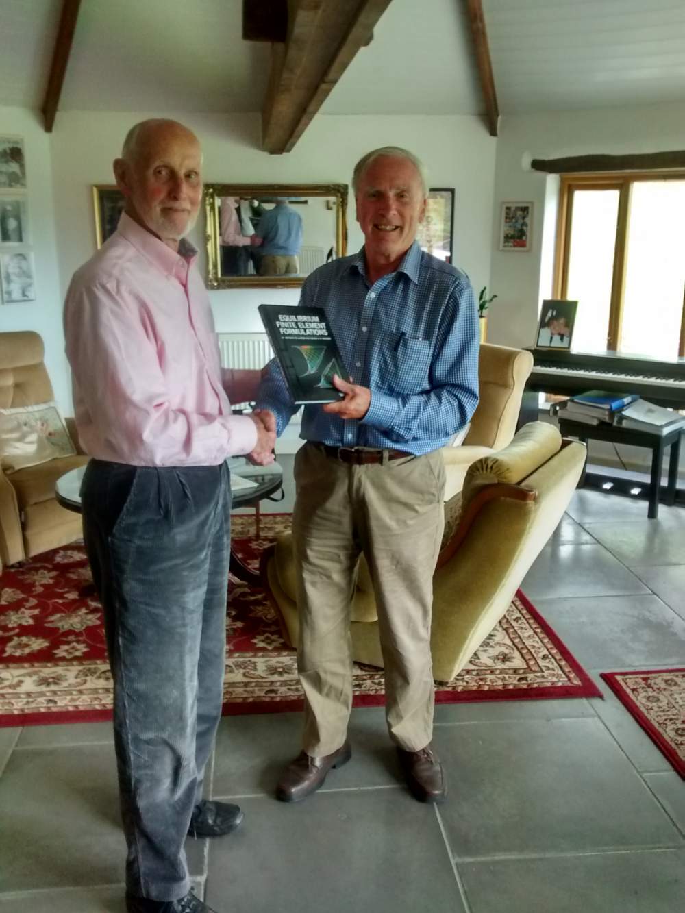 Edward Maunder presents his book to John Robinson